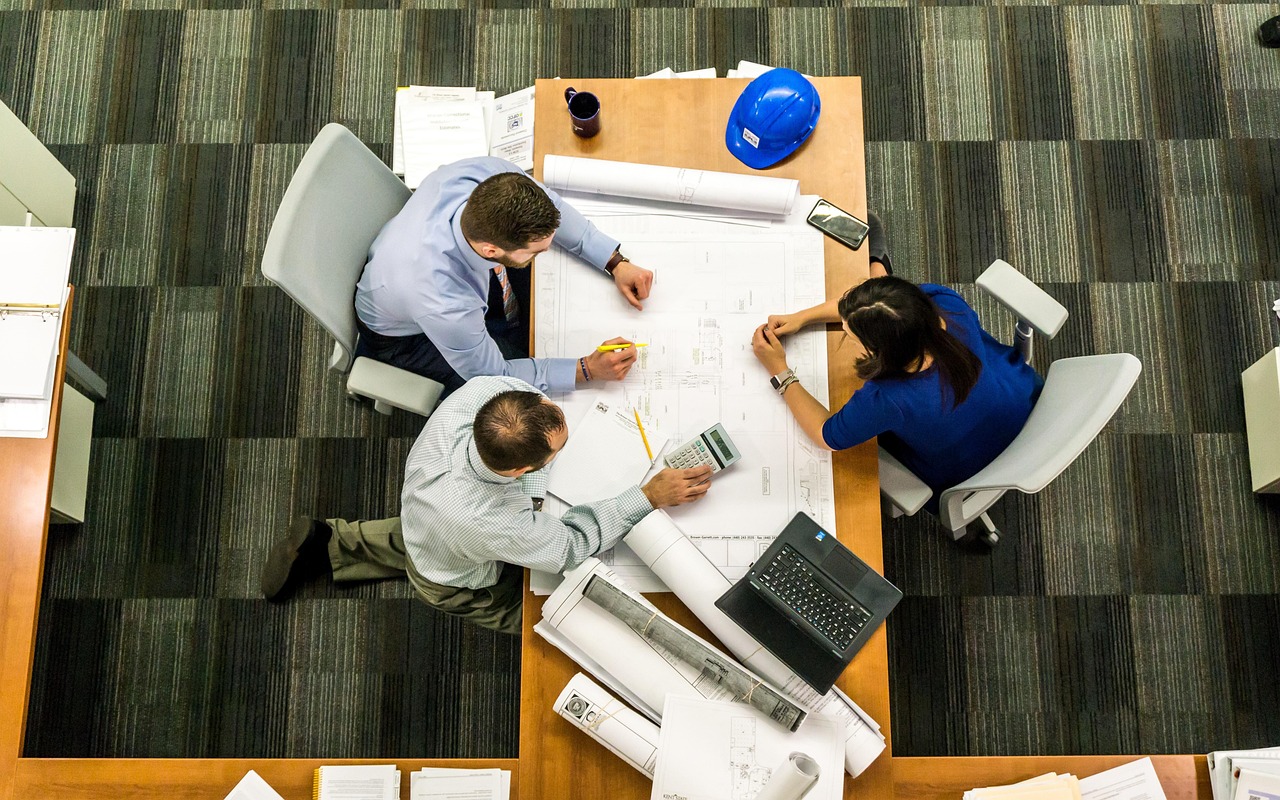 Architects collaborating around a table